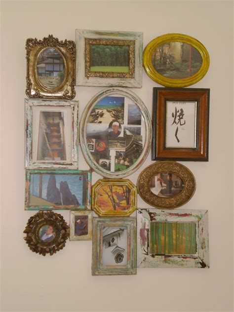 Recycled Photo Frames Joined Into One Large Frame Gallery Wall