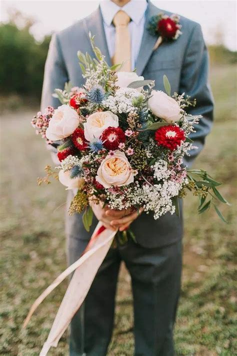 These boutonnieres of plum, dusty purple, and cranberry roses with vibrant greenery completely nailed the aesthetic. Rustic Wedding Rustic Winter Wedding - Nurture Flora Co ...