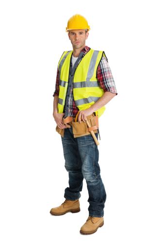 Male Construction Worker Wearing Protective Clothing Stock Photo