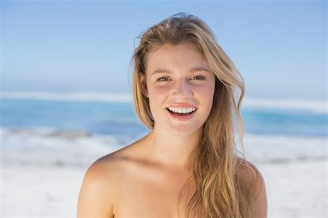 premium photo beautiful happy blonde on the beach