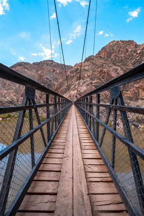 Vertical Beautiful Shot Of A Bridge Above The Colorado River In The