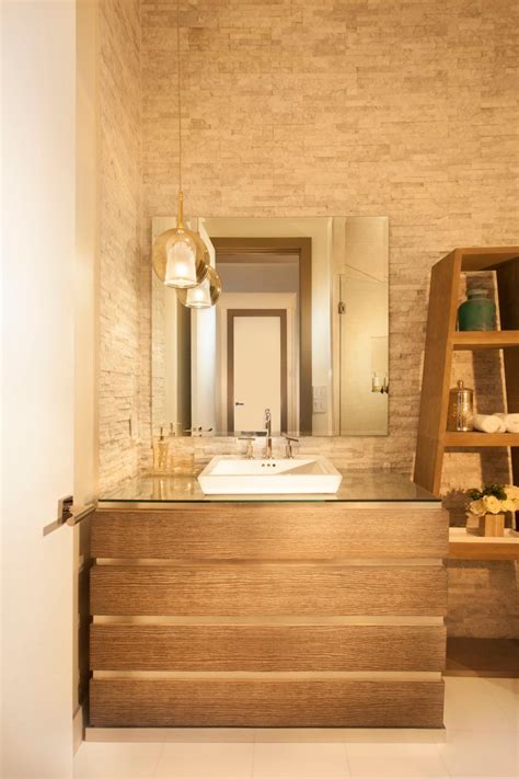 Contemporary Powder Room Features Warm Stone Mosaic Walls