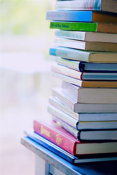 Selective Focus Photo Of Pile Of Assorted Title Books · Free Stock Photo