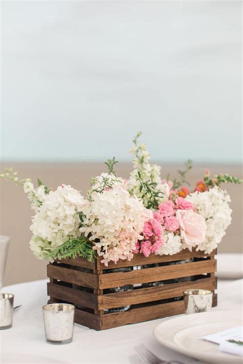 Discover the range of personalised cones, cannons, sachets and more! Flower Crate Centerpiece | AllFreeDIYWeddings.com