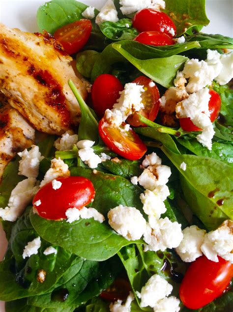 Baby Spinach Salad With Sweet Cherry Tomatoes And Creamy Goat Cheese