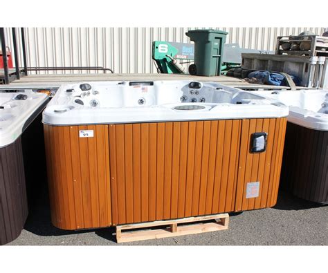 Cal Spas Connect Series Hot Tub With Snow White Interior And 7 Teak Cabinet C W Able Auctions