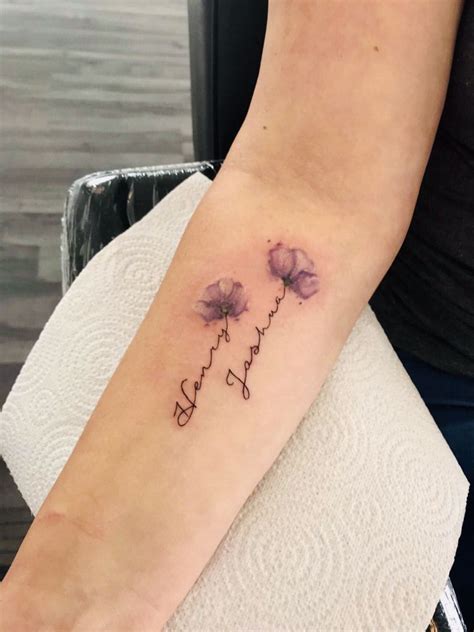 Gorgeous colors bring this amazing tattoo together. Purple poppies and name stems | Name flower tattoo ...