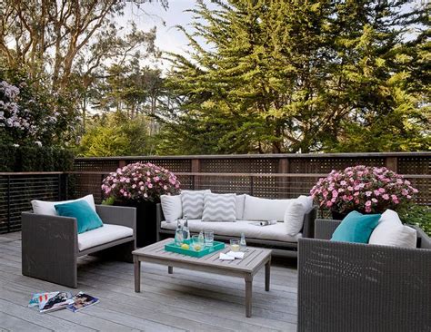 It provides a footrest, but the midsection comes on an. Gray Wicker Outdoor Sofa and Chairs with Teal Pillows ...