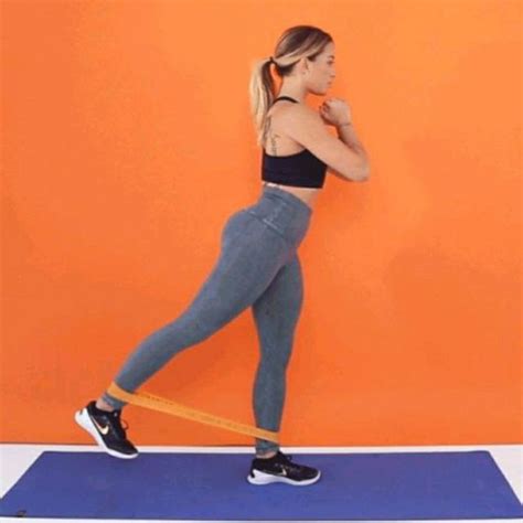 Isometric Glute Squeeze Standing Right Leg Kickback Exercise How To