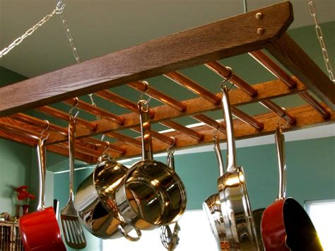 Mounted from the ceiling, under cabinetry, or against a wall, they bring organization and style to a kitchen. How to Build a Hanging Pot Rack | how-tos | DIY