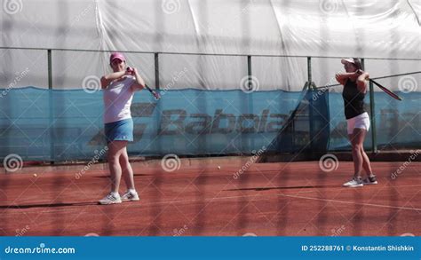 Turkey Antalya Two Women On The Tennis Court Synchronously