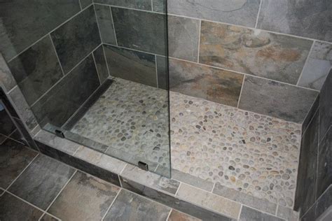 When choosing river rocks for your shower floor, it is always a good idea to seal the rocks so they can fight off stains. Mosaic Tile Company Slate Green Tile, River Rock Shower Floor
