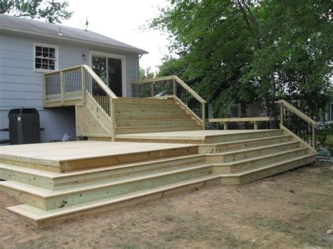 Protect your basement from a cold and damp concrete floor. Pressure-treated pine multi-level deck in Springfield, VA ...