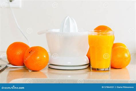 Few Oranges Near The Hand Juicer On Table Stock Image Image Of