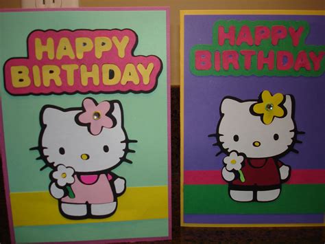 Two Greeting Cards With Hello Kitty On Them One Has A Flower In Her