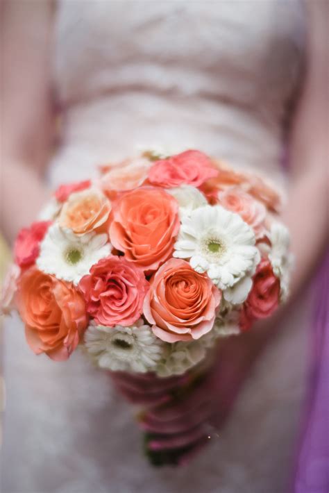 It's a chic rustic style bouquet, bunch of blooming roses, finished with an ivory satin ribbon wrap. Shades of pink & orange bridal bouquet: peach & pink roses ...