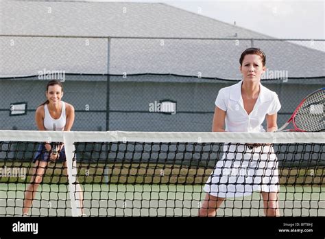 Two Women Playing Tennis Hi Res Stock Photography And Images Alamy