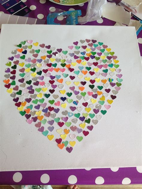 Please watch a full documentary here: Made this today using paint sample cards, a hobby craft heart cutter and some glittery card, on ...