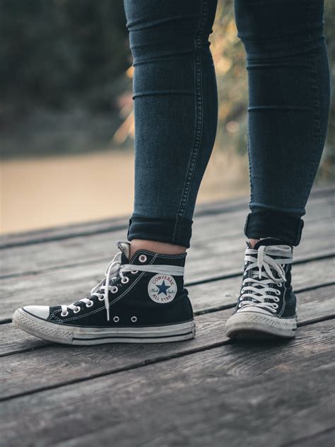 Photo of Person Wearing Converse All Star · Free Stock Photo