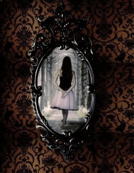 A Woman In A White Dress Is Looking At Herself In A Mirror On The Wall