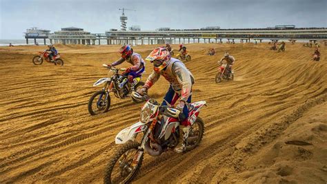 Part 1 of dirt bikes drag racing in the streets. Mass Dirt Bike Racing on Hague Beach | Red Bull Knock Out ...
