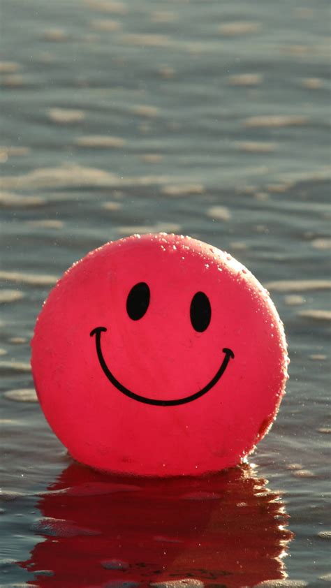 Download Red Smiley Emoji Balloon Wallpaper