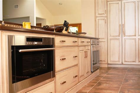 After interviewing with the chef, a cook will come in to trail,' to try out the kitchen, so the chef can see how the applicant works under fire. Paneled Refrigerator | Modern kitchen, Kitchen, Kitchen cabinets