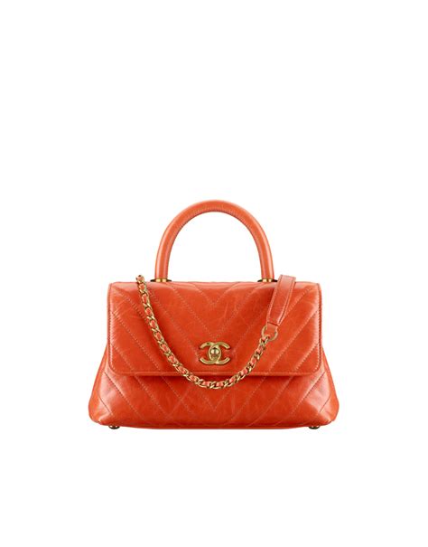 Flap bag with top handle, calfskin & gold-tone metal-orange - CHANEL | Chanel coco handle, Coco ...