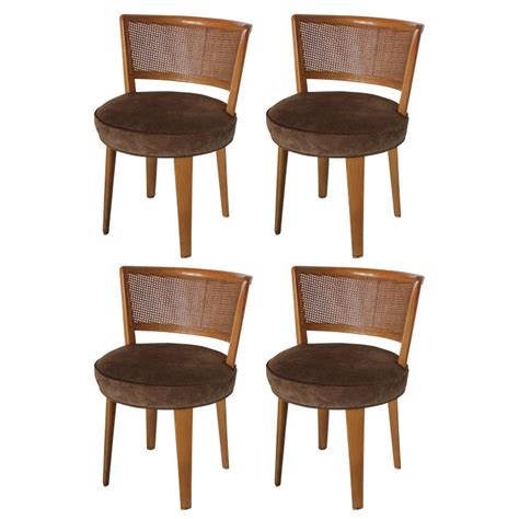Cane back dining chairs white shabby chic. Set of Four Modern Cane Back Swivel Dining Chairs by ...
