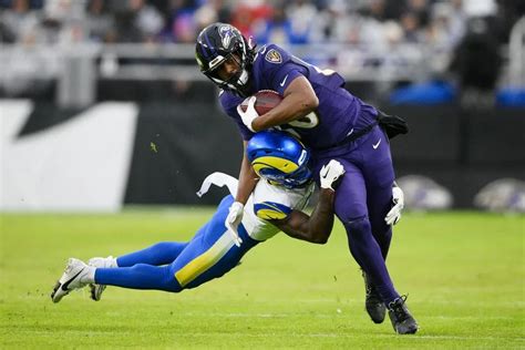 Early Games Lions Fall In Chicago Ravens Slip By Rams In Ot Thriller