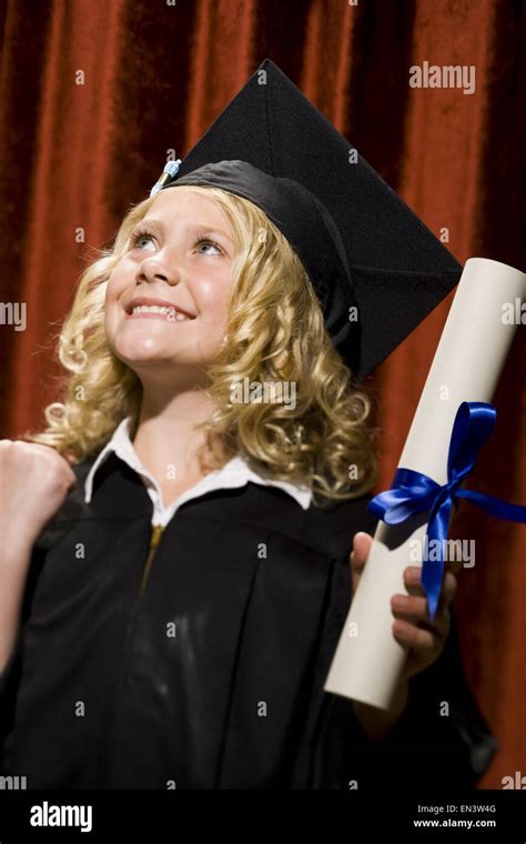 Girl Graduate With Mortar Board And Diploma Smiling Stock Photo Alamy