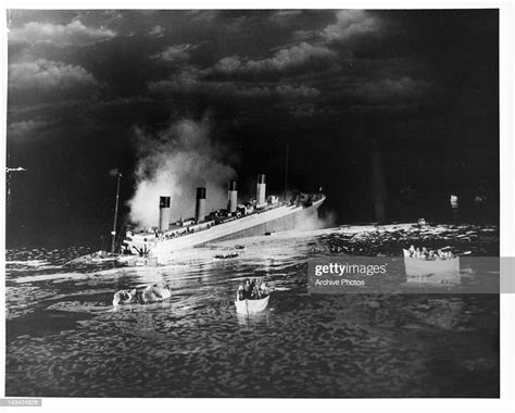 The liner RMS Titanic sinking in a scene from the film 'Titanic