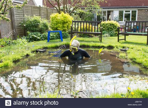 Mature Woman Having Fun Wearing Wetsuit Goggles Snorkel