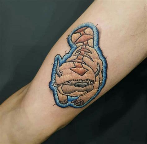 these tattoos look like patches embroidered into people s skin twistedsifter