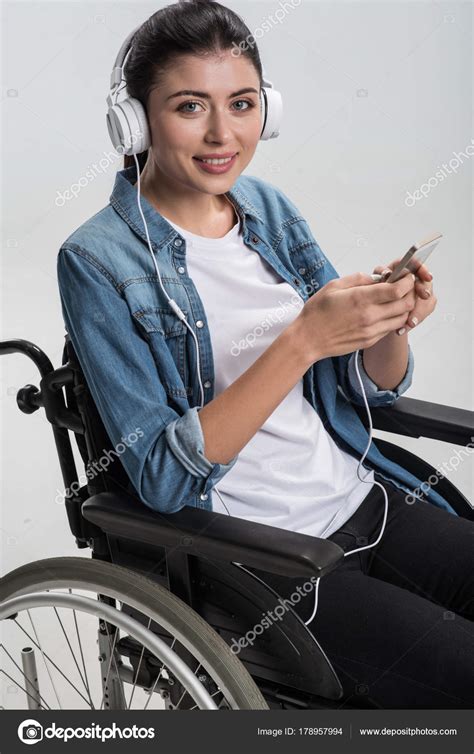 Beautiful Disabled Woman Listening To Music — Stock Photo © Yacobchuk1