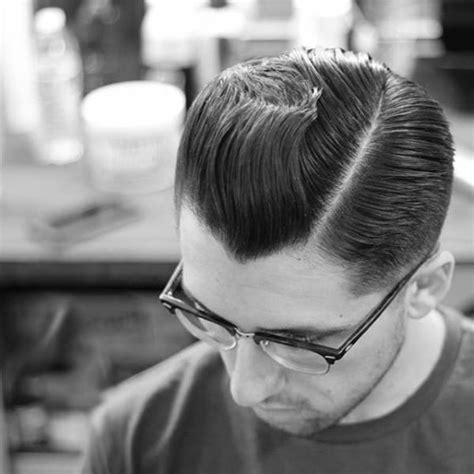 This low skin fade comb over haircut with gentle part is super easy to achieve and can be added with a comb overlook from the side. Comb Over Haircut For Men - 40 Classic Masculine Hairstyles