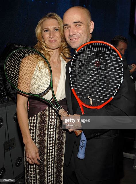 Steffi Graf And Andre Agassi Holding Andres First Tennis Racket When