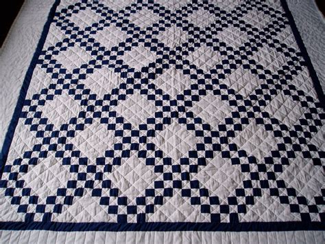 Navy blue or navy is a dark shade of the color blue. Navy Blue and White Quilt | Blue quilts, Patchwork quilt ...