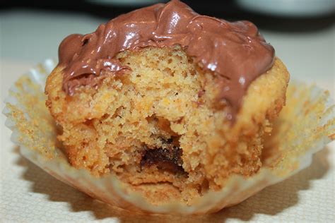 Place on a foil lined baking sheet. Chocolate frosted Sweet Potato cupcake with chocolate kiss ...
