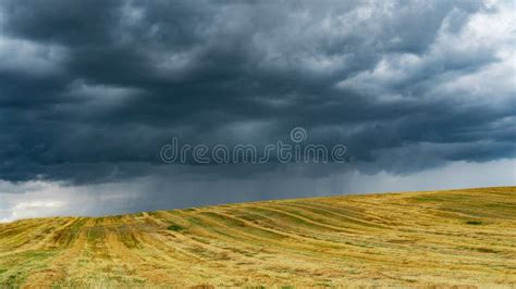 Thereal Rain Is Pouring Down Heavy Rain Over A Field In The