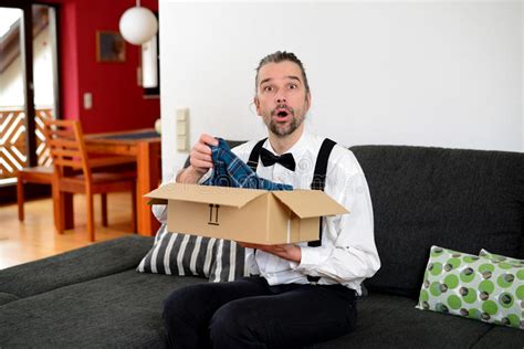Angry Man Opening The Wrong Package Stock Image Image Of Lifestyle