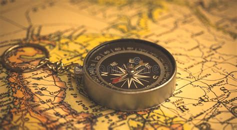 Old Compass On A Vintage World Map Selective Focus Cartography And