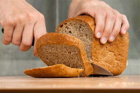 Cutting A Loaf Of Bread Stock Image Image Of Closeup 62498987