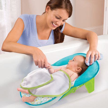 A baby bathtub will help you prop up a wriggling newborn. Summer Infant Bath Sling with Warming Wings | Walmart Canada
