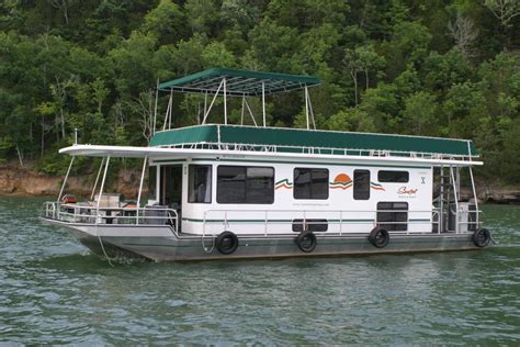 Stand at the helm and navigate your crew to a week of unforgettable memories. 50' Family Cruiser Houseboat on Dale Hollow Lake