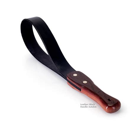 leather strap spanking paddle handmade bdsm by lvx supply and co