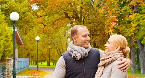 smiling couple in autumn park stock image image of outdoors middleaged 153502917