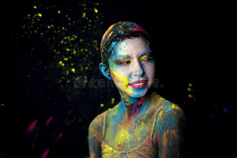 Portrait Of Beauty Model With Holi Colorful Powder Art Makeup On Black