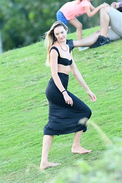 Candice Swanepoel Flashes Her Panties And Flaunts Slender Legs At The