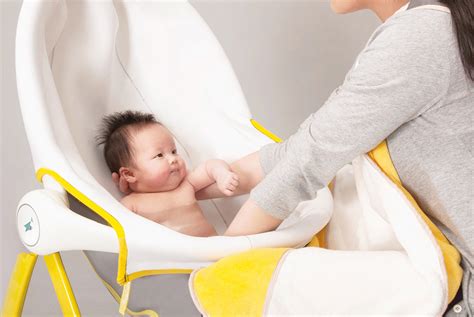 Tall, this stand elevates the 2 position baby bather bath tub allowing parents the convenience of bathing their baby without having to lean over a standard bath tub or kitchen sink. Baby Bath Time Just Got Better | Yanko Design